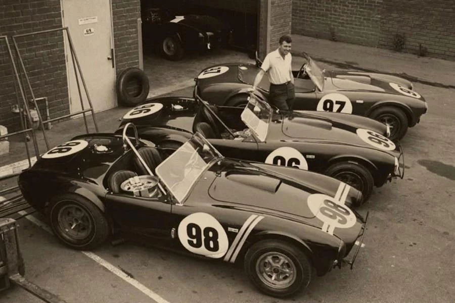 Carroll Shelby standing with his creations